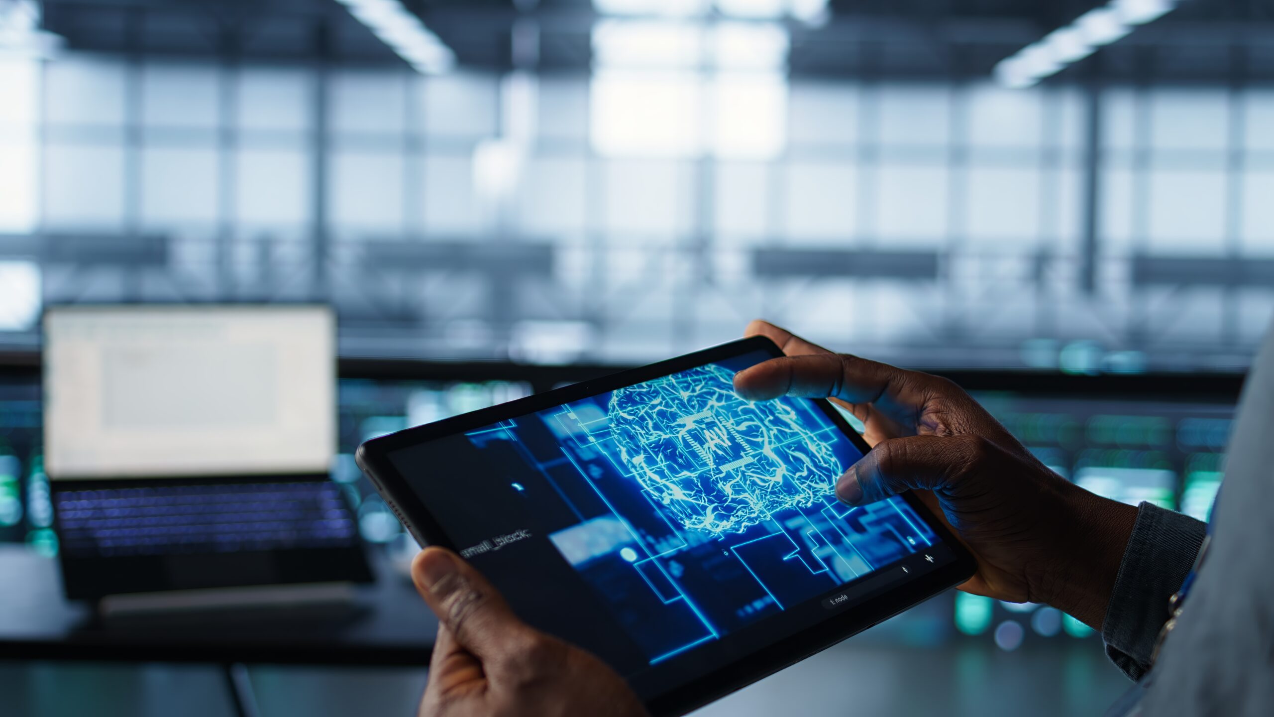 Programmer in data center using AI tech on tablet, testing equipment failover scenarios. Server farm IT specialist uses artificial intelligence on device, ensuring data accessibility, camera B closeup